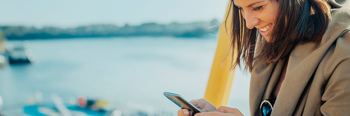 Woman-using-her-mobile-phone_web_flip.jpg